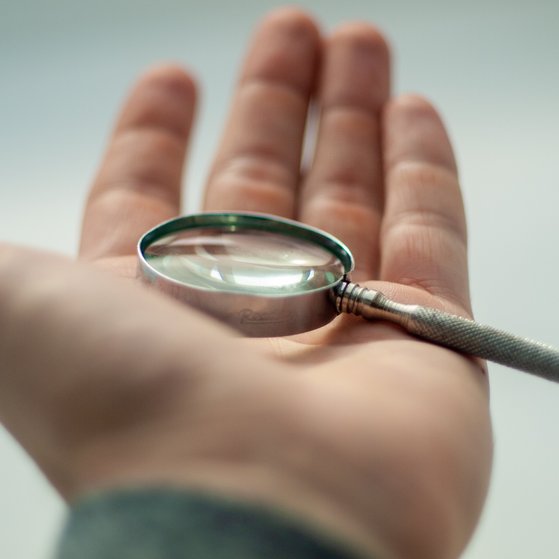Small magnifying glass made out of metal