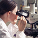 Scientist with microscope