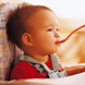 Baby with spoon