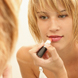 Woman applying make-up